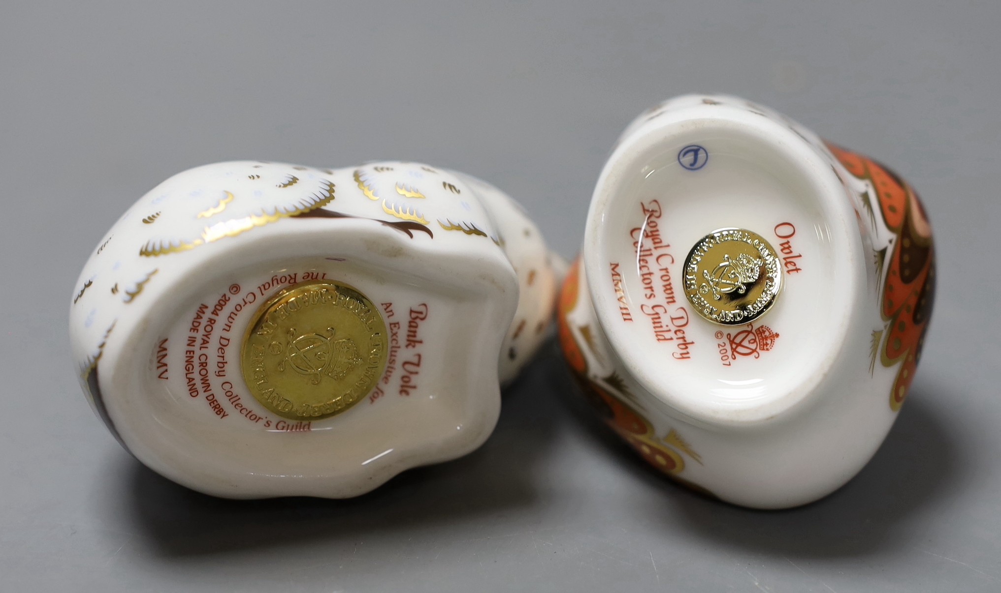 Four Royal Crown Derby Collectors Guild paperweights - Owlet, Bank Vole, Scruff and Teal Duckling, all boxed with gold stoppers